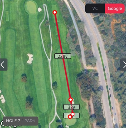 Shot-tracking screenshot of hole 7 at Torrey Pines North showing a red tee-shot line labeled 228 yards over satellite imagery